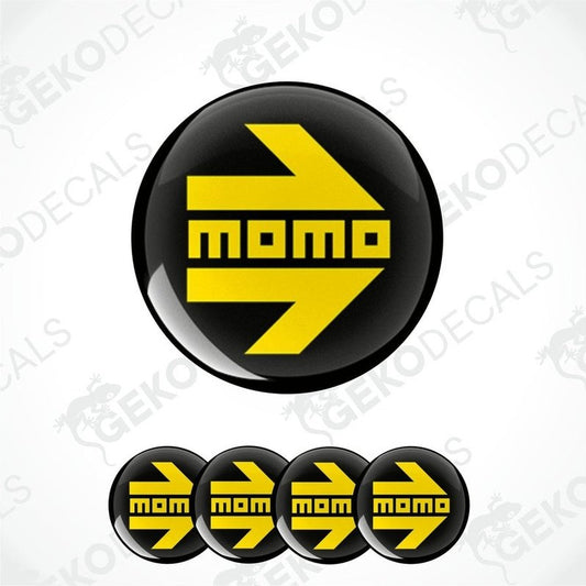 A set of four black vinyl stickers with yellow text and graphics, including the word 'MOMO' in a stylized font.