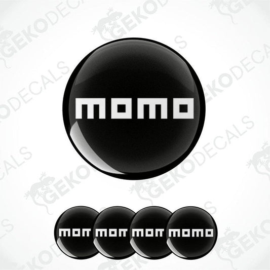 A set of black vinyl decals with the text 'momo' on them, presented in a circular arrangement.