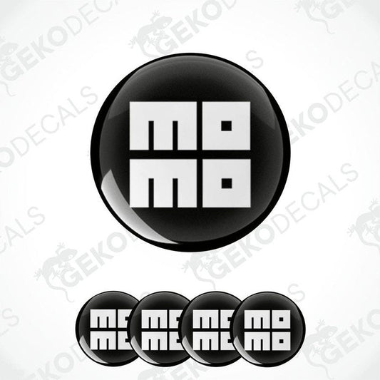 A set of four round vinyl stickers with the word 'MOMO' written on them, with a black background and a white border.