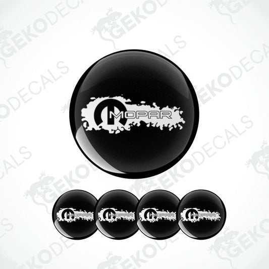 A set of four black and white vinyl decals with the MOPAR logo.