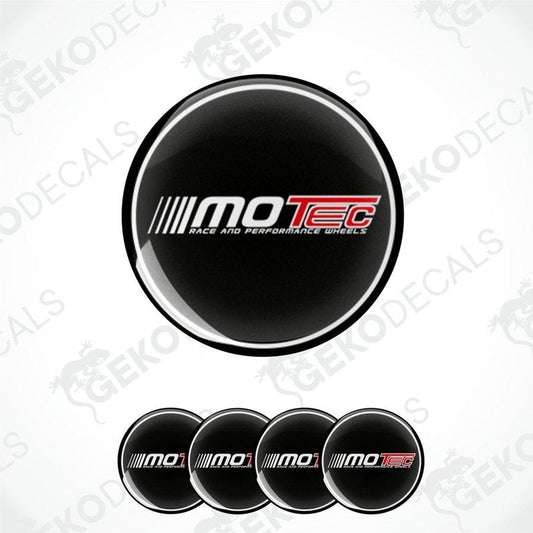 A set of four black vinyl stickers with the 'MOTEC' logo in white and red, designed for use as car wheel decals.
