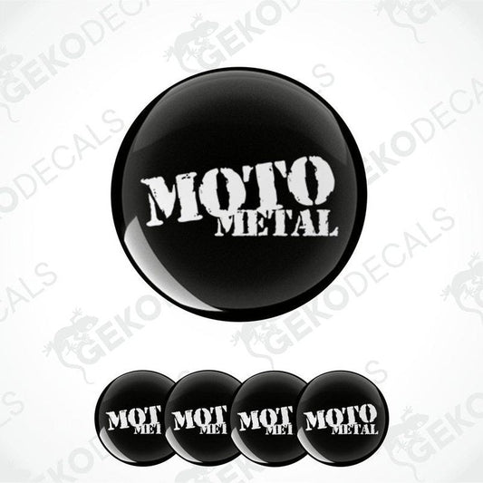 A set of four black vinyl stickers with the text 'MOTO METAL' embossed on them, arranged stacked on top of each other.