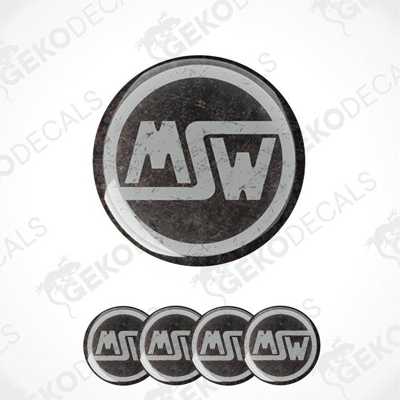 A set of four black vinyl stickers with the letters 'MSW' in the center, arranged in a circular pattern with a visible brand logo.