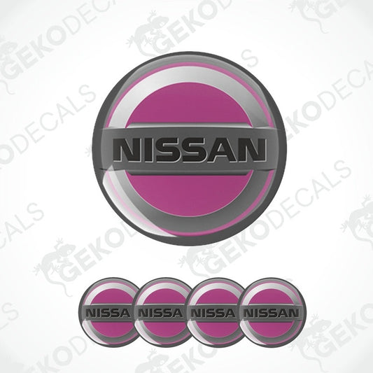 A set of vinyl decals with polyurethane coating, featuring the NISSAN logo in silver and pink colors.