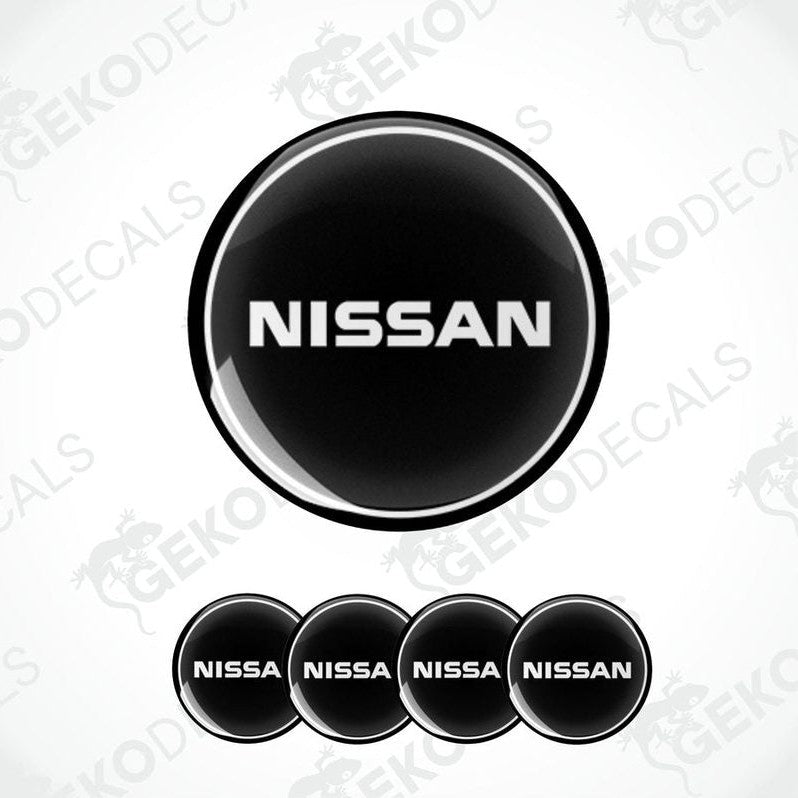 Set of five black vinyl decals with the NISSAN logo, four are round and one is rectangular.