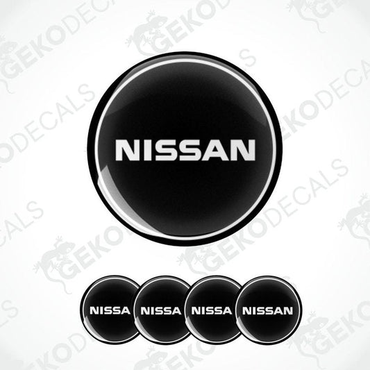 Set of five black vinyl decals with the NISSAN logo, four are round and one is rectangular.