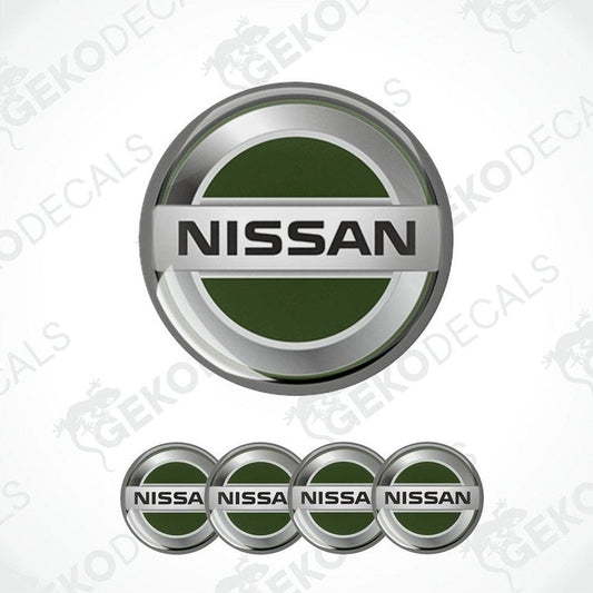 A set of four green and silver NISSAN branded vinyl decals with a silver and black trim.
