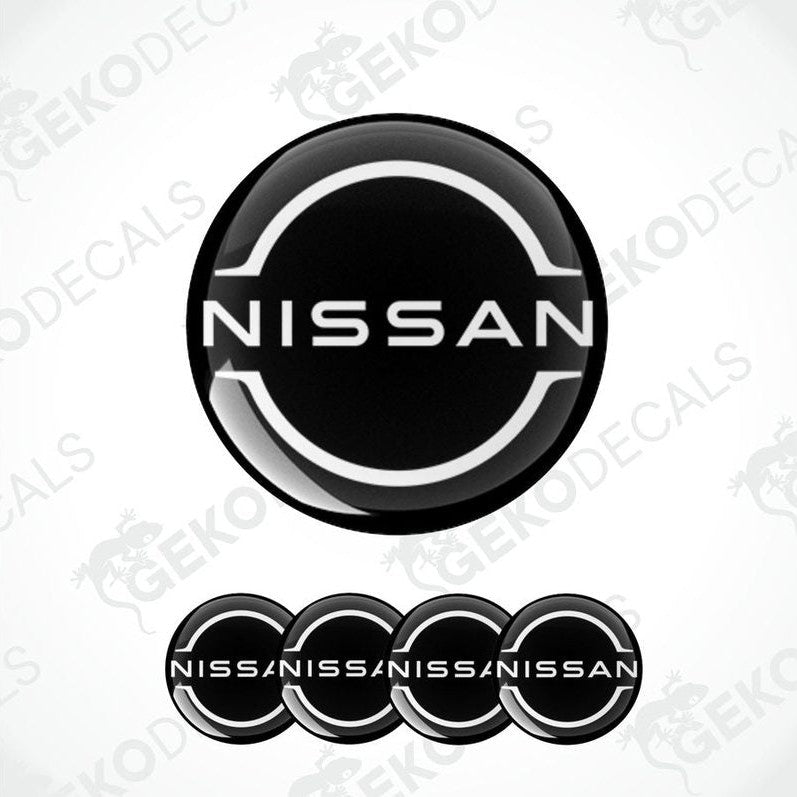 Set of five black vinyl decals with the NISSAN logo, four are round and one is rectangular.