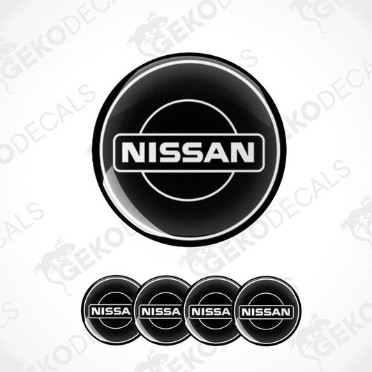 Set of five black vinyl decals with the NISSAN logo, four are round and one is rectangular.