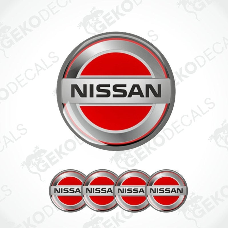 A set of four red vinyl stickers with the NISSAN brand logo on them.