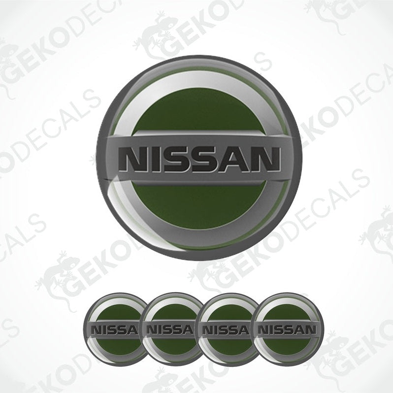 A set of vinyl decals with polyurethane coating, featuring the NISSAN logo in silver and green colors.