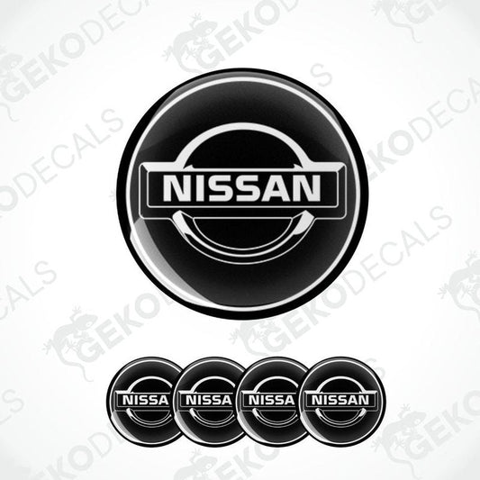 A set of four black vinyl decals with the NISSAN logo.
