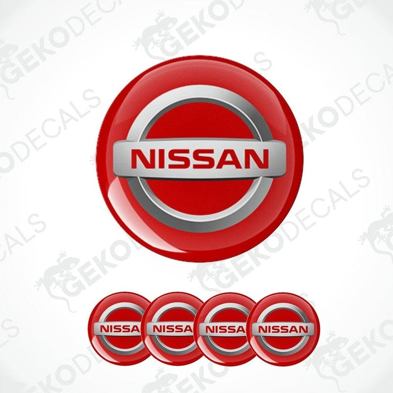 A set of vinyl decals with polyurethane coating, featuring the NISSAN logo in silver and red colors.