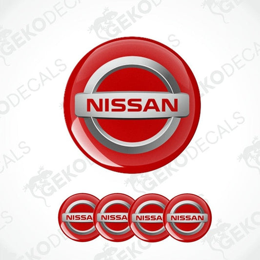 A set of vinyl decals with polyurethane coating, featuring the NISSAN logo in silver and red colors.