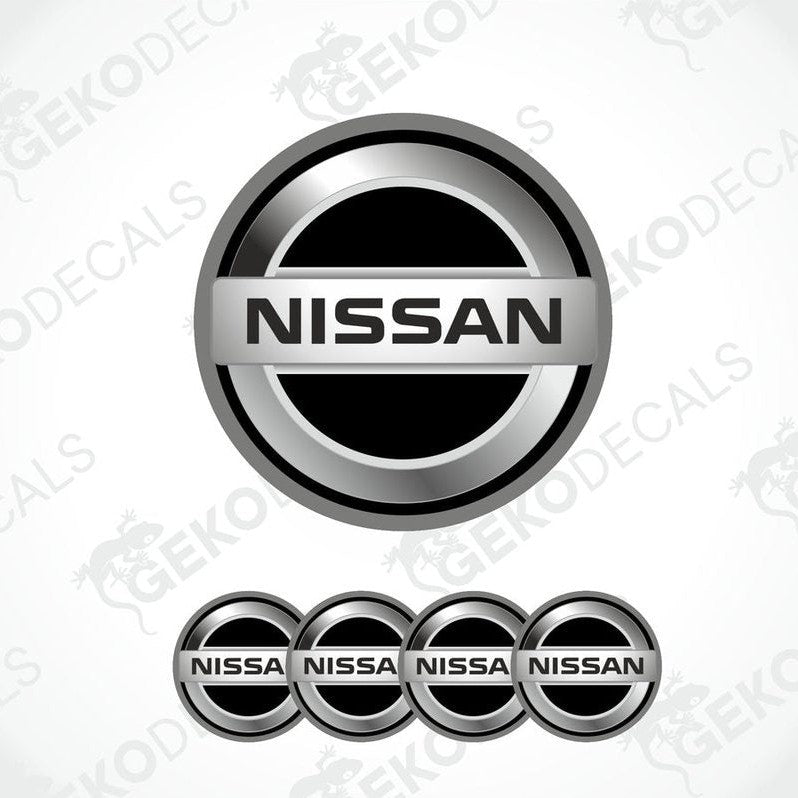 A set of four silver NISSAN branded vinyl stickers with a polyurethane coating.