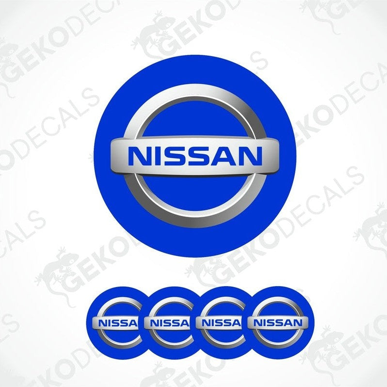 A set of four blue vinyl stickers with the NISSAN brand logo.