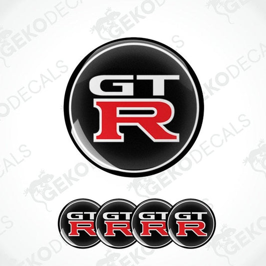 A set of four vinyl decals for a NISSAN GT R, featuring the GT R logo in black, red, and white colors.