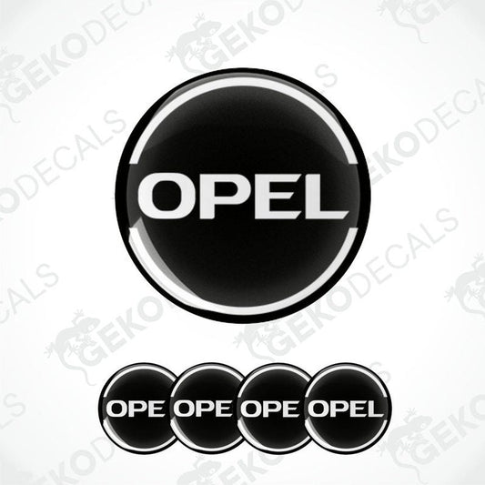 A set of four black, white, and gray vinyl stickers with the OPEL brand logo.