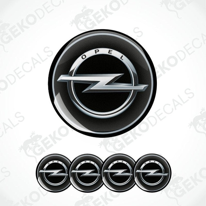 A set of four black vinyl stickers with a silver OPEL logo, designed for use as car decals.