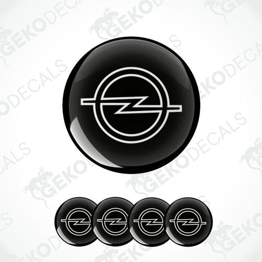 A set of four black and white vinyl decals with the Opel logo.