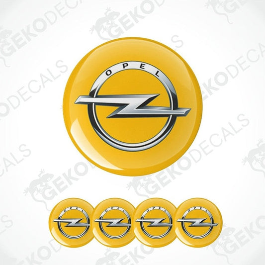 A set of four yellow vinyl stickers with a silver OPEL logo, designed for use as car decals.
