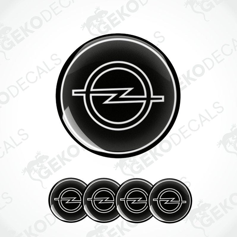 A set of four black and white vinyl decals with the Opel logo.