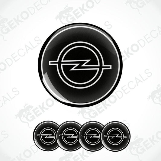 A set of four black and white vinyl decals with the Opel logo.