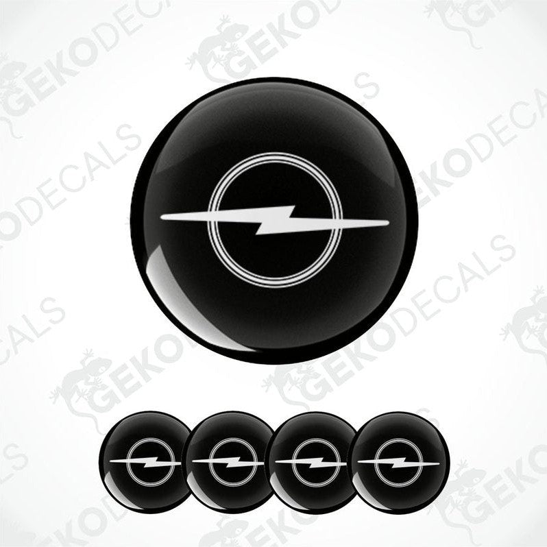 A set of four black and white vinyl decals with the Opel logo.