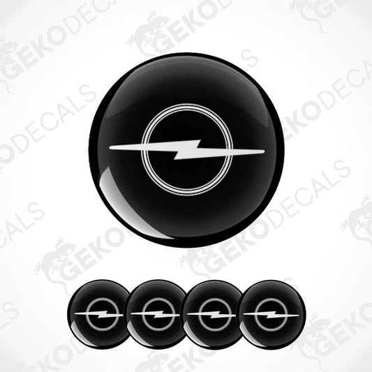 A set of four black and white vinyl decals with the Opel logo.