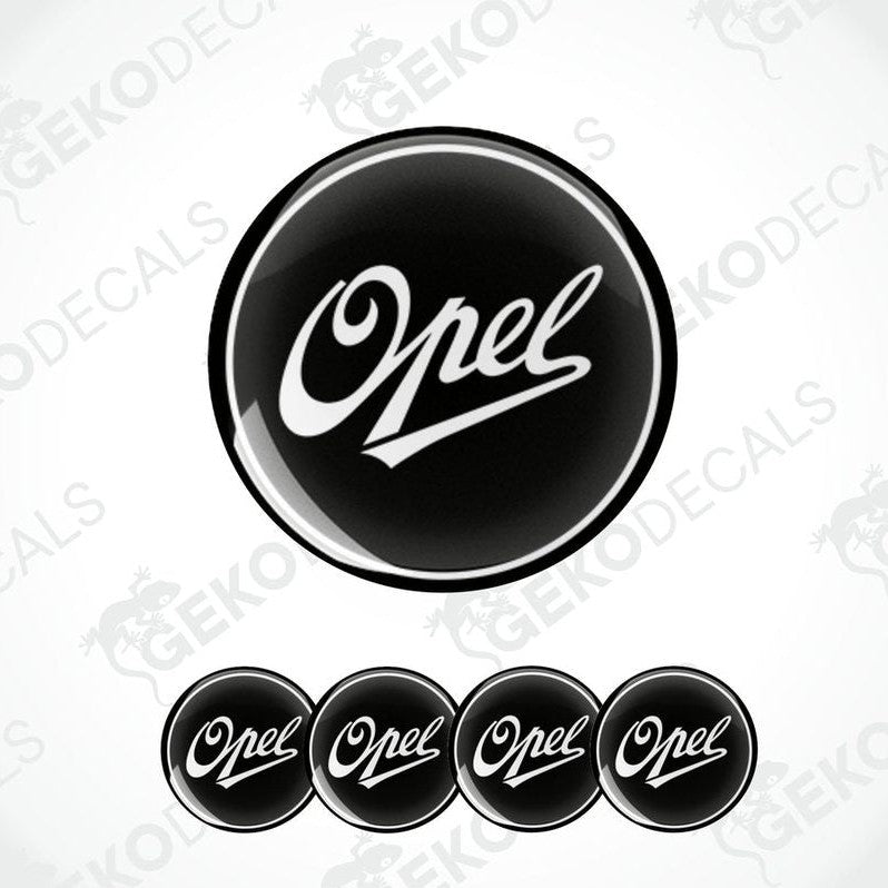A set of four black and white vinyl stickers with the OPEL brand logo.
