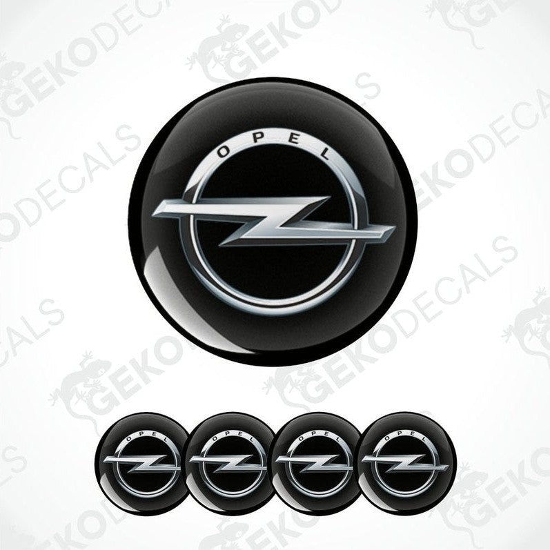 A set of four black vinyl stickers with a silver OPEL logo, designed for use as car decals.
