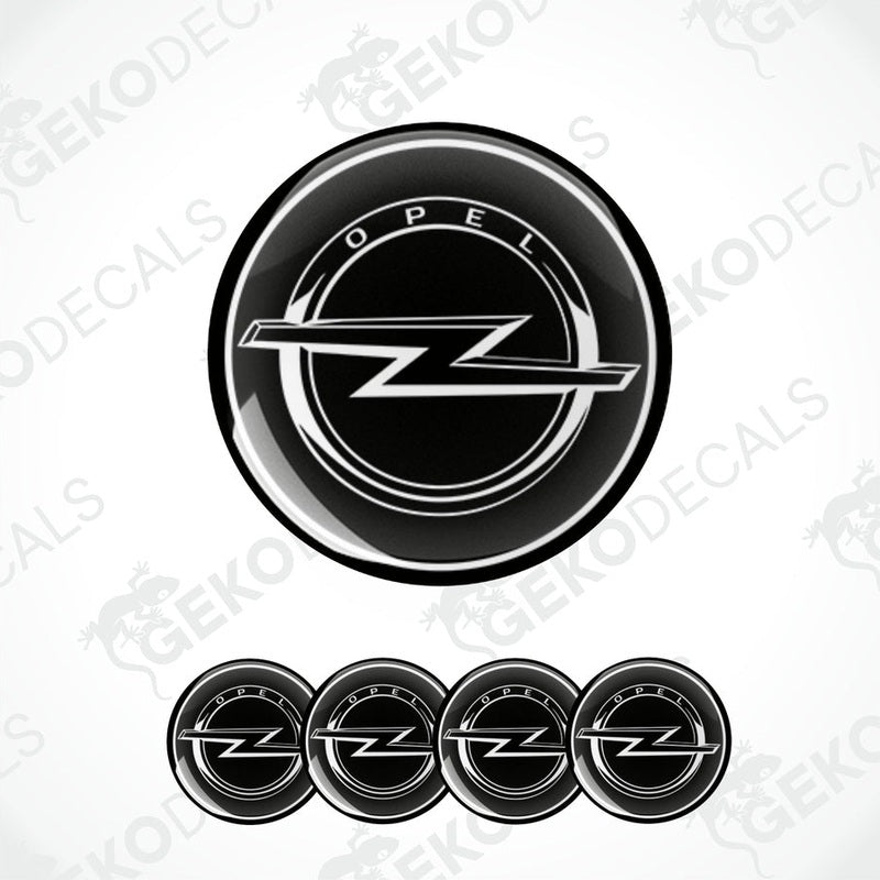 A set of four black vinyl stickers with the OPEL brand logo designed for use on car wheels.