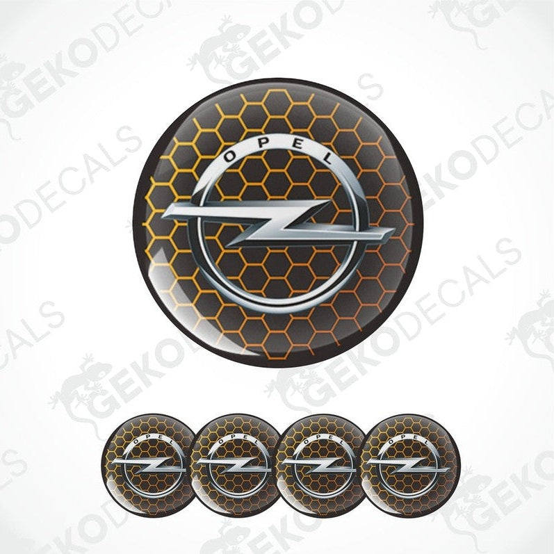 A set of four orange and silver OPEL branded vinyl stickers for car decals, displayed with a honeycomb pattern design.