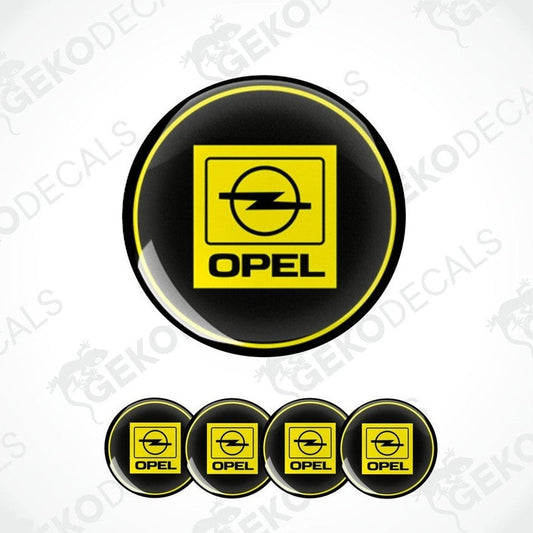 A set of four circular vinyl stickers with a yellow, black, and white color scheme, featuring the Opel brand logo.