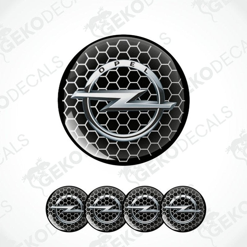 A set of four white and silver OPEL branded vinyl stickers for car decals, displayed with a honeycomb pattern design.