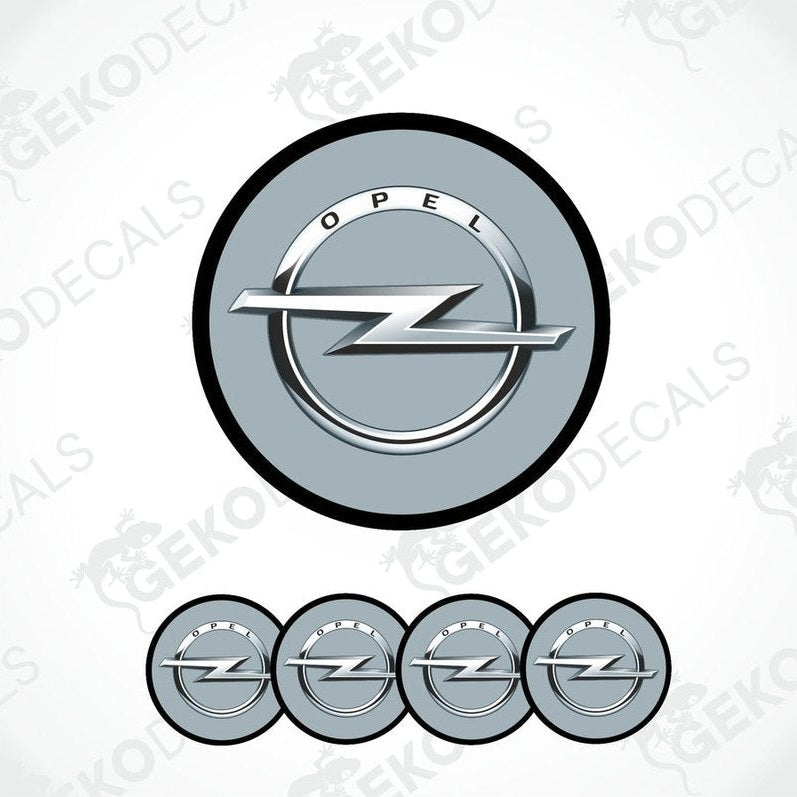 A set of four grey  vinyl stickers with a silver OPEL logo, designed for use as car decals.