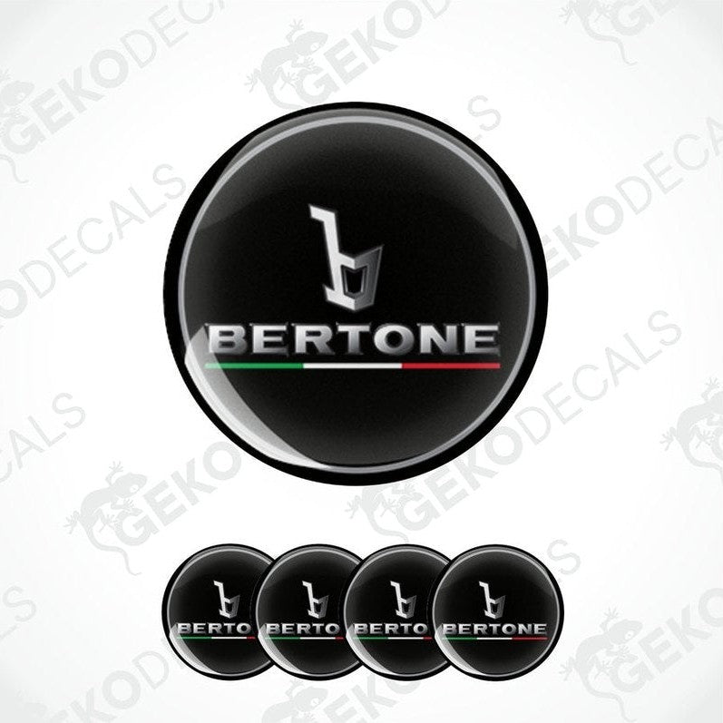 A set of round car decals featuring the Bertone logo with a black background, silver text, and red, green, and white stripes.