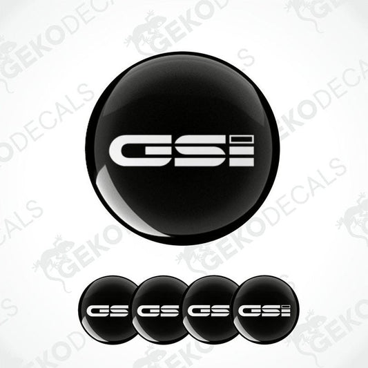 A set of black vinyl decals with 'OPEL GSi' text on them, typically used as car wheel caps.