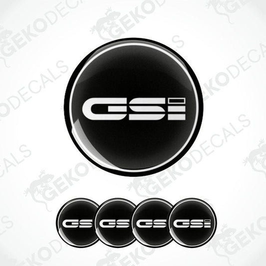 A set of black vinyl decals with 'OPEL GSi' text on them, typically used as car wheel caps.