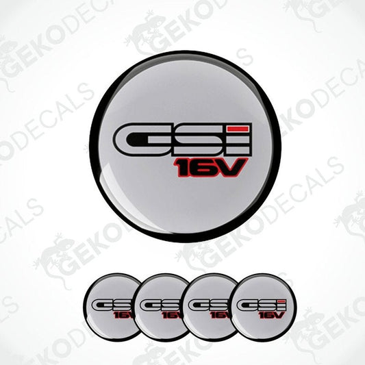 A set of four gray vinyl stickers with the text 'OPEL GSI 16V' and a red and white logo on them.