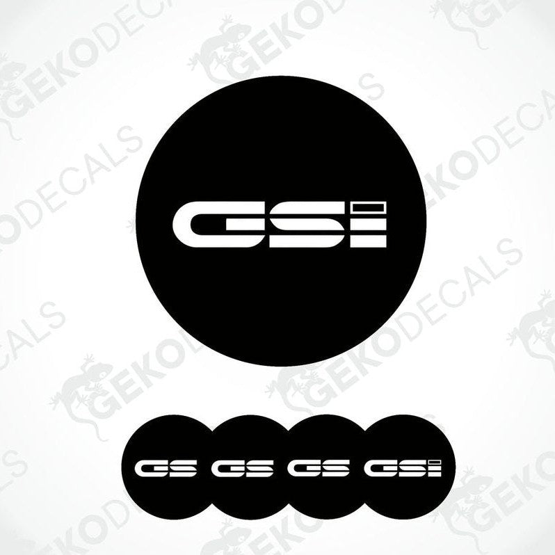 A set of black vinyl decals with 'OPEL GSi' text on them, typically used as car wheel caps.