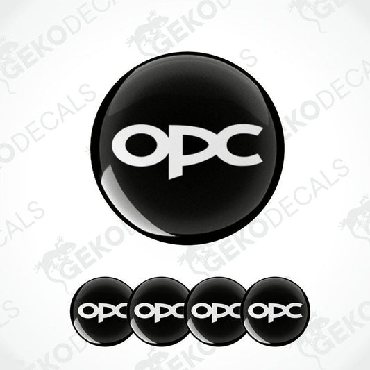 A set of four black vinyl stickers with the white text 'OPEL OPC' designed on them