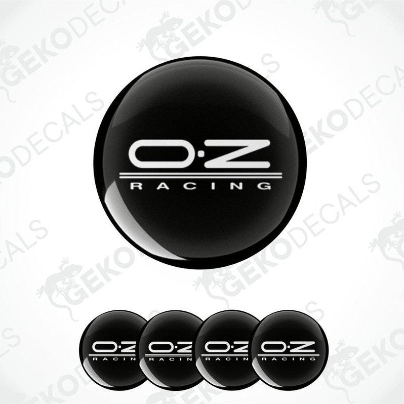 A set of black vinyl decals with the 'OZ Racing' logo applied on them, typically used for car customization.