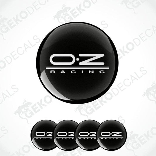 A set of black vinyl decals with the 'OZ Racing' logo applied on them, typically used for car customization.