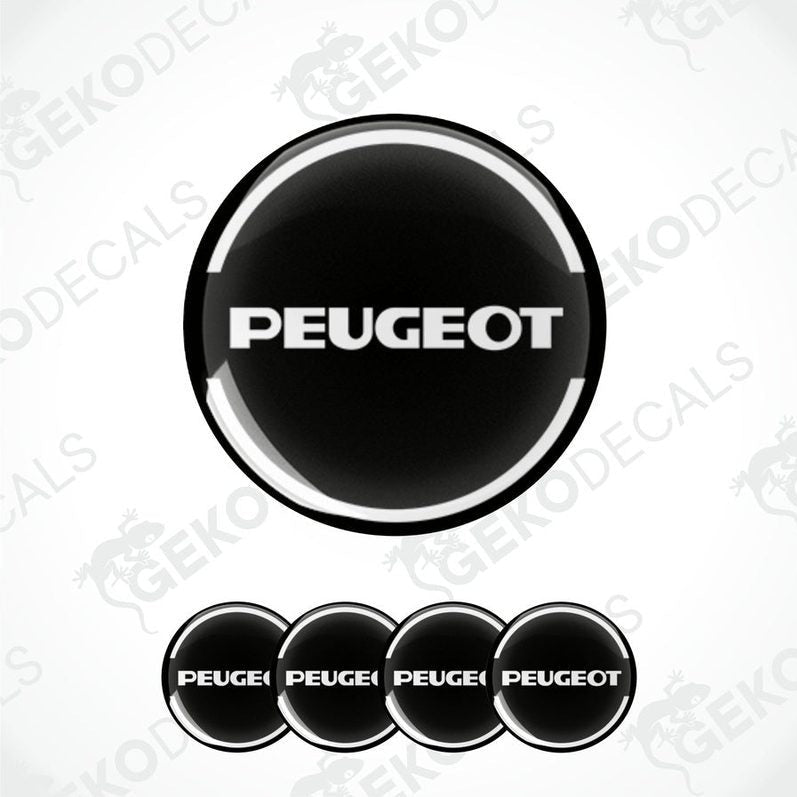 A set of four black and white vinyl decals with the Peugeot car logo.