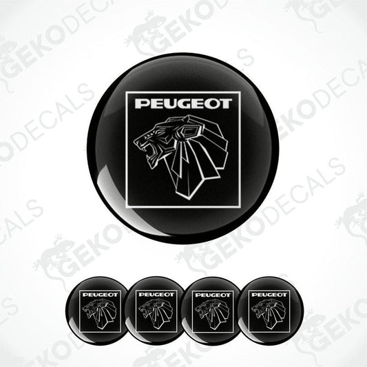 A set of black vinyl decals with the PEUGEOT logo applied on them, displayed on a white background.