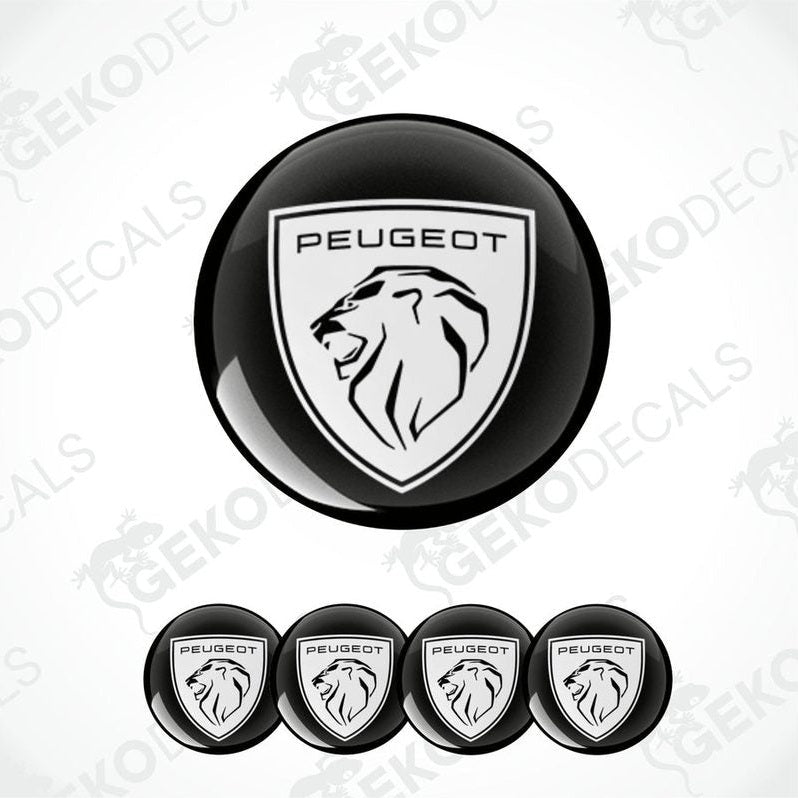 A set of four black vinyl stickers with the PEUGEOT brand logo.