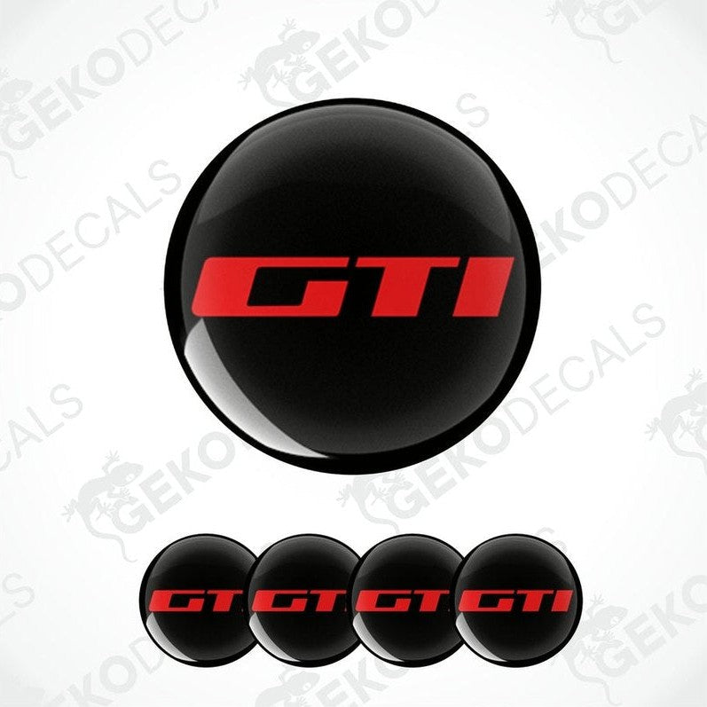 A set of four black vinyl stickers with the word 'PEUGEOT GTI' written in red.