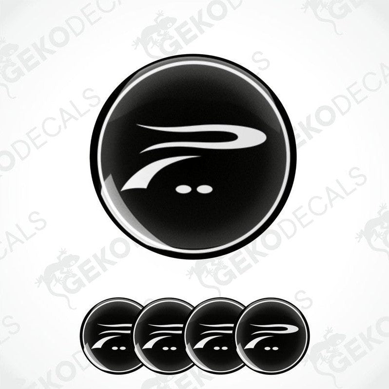 A set of four black vinyl stickers with a geometric design, displayed on a white background.