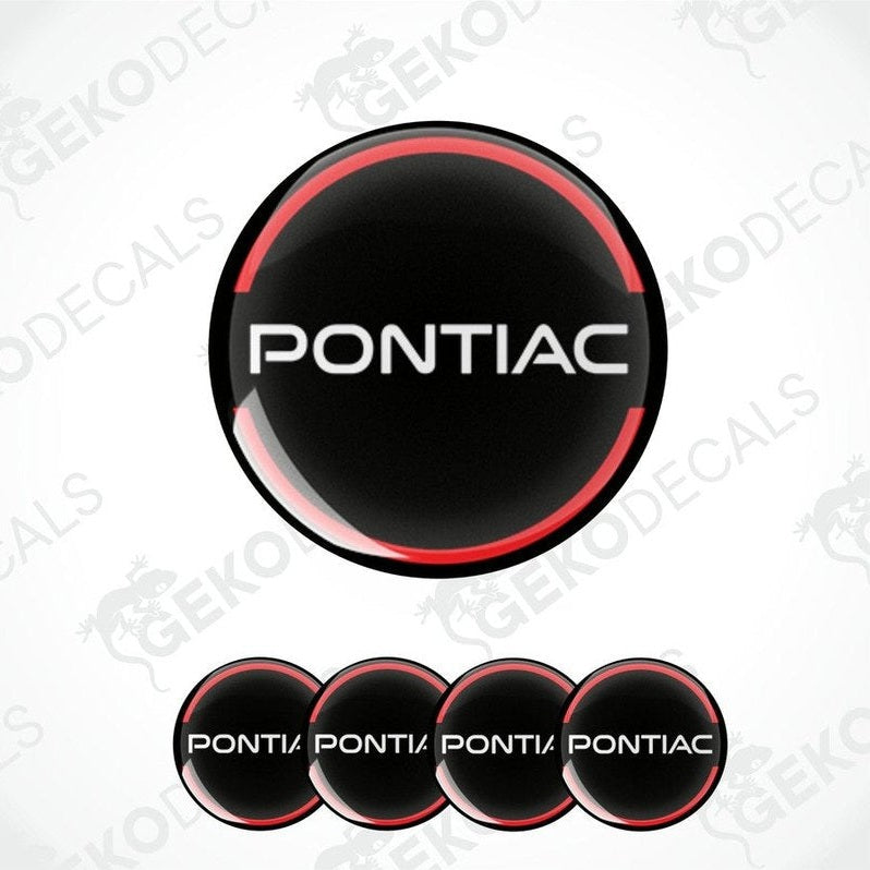 A set of four vinyl decals with polyurethane coating designed to look like PONTIAC wheel caps, predominantly black with red accents and white text.